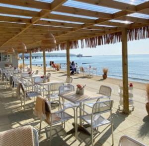 Outdoor seating at Fins Beach Cafe on the Isle of Wight