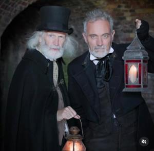 Two men taking a tour around Osborne grounds on the Isle of Wight