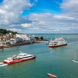 Aerial shot of Red Funnel's red jet and vehicle ferry at Cowes