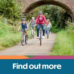 Family riding their bikes on the Isle of Wight