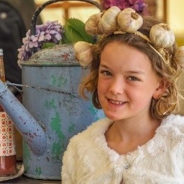 Girl with a garlic headband