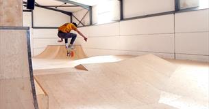 Man skating at Canopy Skatepark, Chale, Things to Do, activities