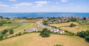 Isle of Wight, Accommodation, Seaview Holidays, image showing aerial view of Holiday cottages and views to sea.