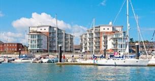 Marinus apartments building, view of the building and Harbour from the sea, Self-catering, Cowes, Isle of Wight