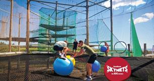Boy and adult playing on Skynets at Sandham Gardens, Sandown, Things to Do