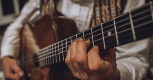 Man playing a guitar, Sunday Jazz event at The Garlic Farm, food & drink, what's on, Isle of Wight
