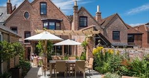 Outside dining area in garden at One Holyrood, B&B, Newport, Isle of Wight