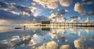 Clouds reflecting on the sea next to Bembridge lifeboat station, Bembridge Lane End Beach, Isle of Wight, Things to Do