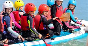 Children on large paddleboard, UKSA event, children's activities, Easter event, what's on, Cowes, Isle of Wight
