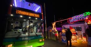 Southern Vectis bus in front of Christmas lights, Isle of Wight, event, what's on