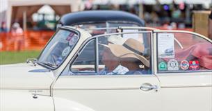 Isle of Wight, Things to Do, Events, Isle of Wight Steam Railway, Morris Minor Rally, Image of convertible morris minor with top down, driver and pass