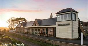 Sunset, outside view of Off The Rails Yarmouth, Isle of Wight, restaurant