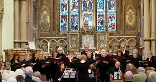 Choir performing to an audience in a church, music at Newport Minster, Isle of Wight, what's on, event