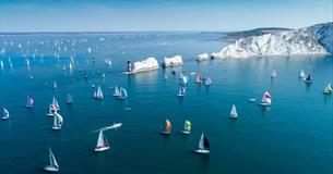 Yachts passing the Needles in the Round the Island Race, Isle of Wight, What's On - Image credit: Paul Wyeth
