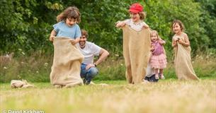 Children taking part in a sack race, Bembridge Windmill, National Trust, Isle of Wight, events, what's on - photo credit: David Kirkham