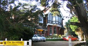 Front view of The Hermitage B&B and the driveway in front of B&B, bed and breakfast, Isle of Wight.