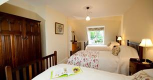 Twin bedroom at Wydcombe Holiday Cottage, National Trust, Isle of Wight, self catering, image credit: John Plimmer