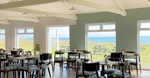Table and chairs inside the cafe at Isle of Wight Pearl, food and drink, shopping