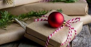 Presents and baubles on a wooden table, Christmas Fair at Northwood House, Isle of Wight, event, what's on, family fun, children activities, dog frien