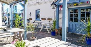 Outside eating area at The Kings Head, Yarmouth, Isle of Wight, pub, local produce, live music