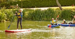 Family paddleboarding and kayaking at The Lakes Rookley, Isle of Wight, Things to do, watersports