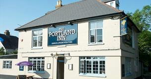 Outside view of the Portland Inn, Gurnard, local produce, pub