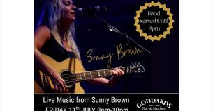 Sunny Brown playing a guitar and singing, live music at Goddards Brewery, Sandown, Isle of Wight, what's on, event