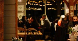 People eating inside The Garlic Restaurant, Isle of Wight, what's on, event, live music, food
