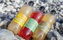 Selection of soft drinks produced by Wight Crystal laid on the beach, Isle of Wight, local produce, let's buy local