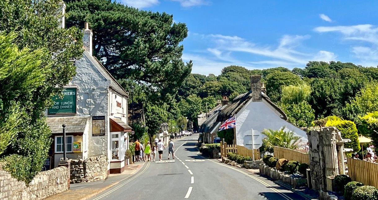 People walking in Godshill village