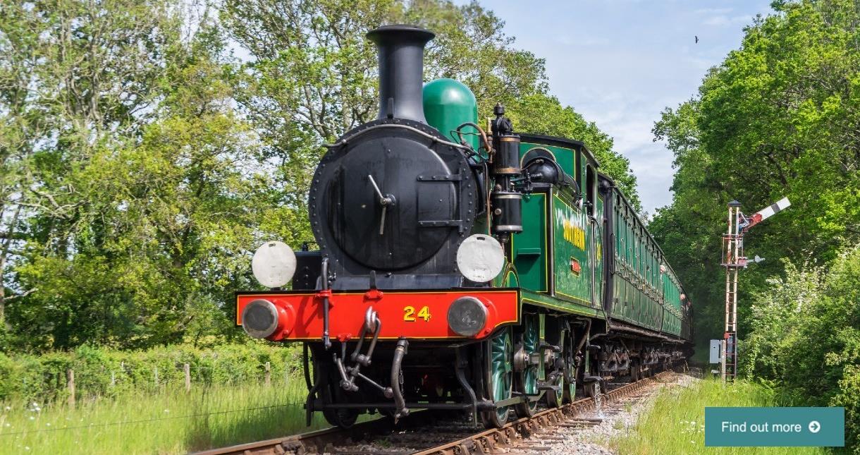 Steam train travelling through the countryside - Copyright: John Faulkner