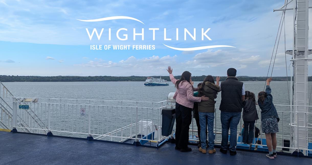 Family on the deck of a Wightlink ferry, Isle of Wight