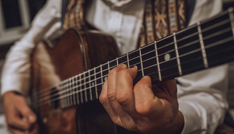 Man playing a guitar, Sunday Jazz event at The Garlic Farm Restaurant, food & drink, what's on, Isle of Wight