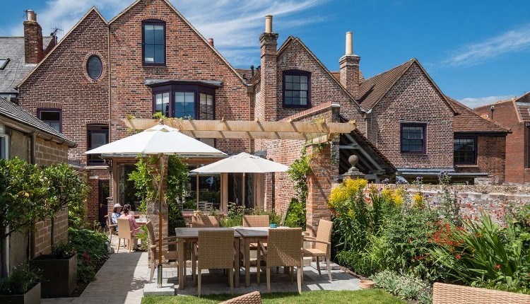 Outside dining area in garden at One Holyrood, B&B, Newport, Isle of Wight