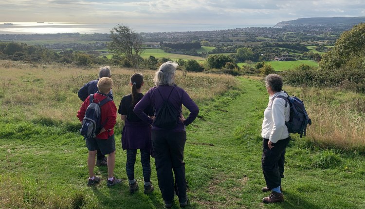Group of walkers at Brading viewpoint, Isle of Wight, Discover Wight, guided walks and tours, bespoke tours, walking