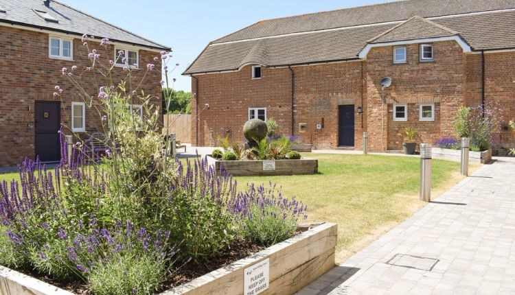 Outside view of the courtyard gardens within the cottages at Island Riding Centre, self catering, Newport, Isle of Wight