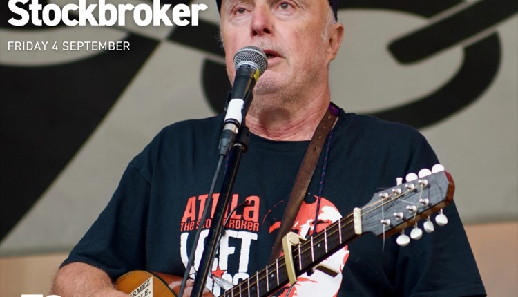 Punk poet and musician Attila the Stockbroker performing during a live spoken word and music event on the isle of wight