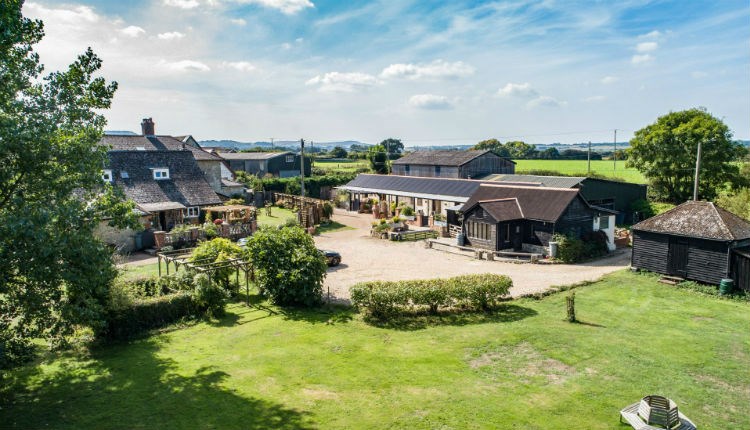 Aerial view of Middle Barn Farm with rolling countryside, self-catering, Isle of Wight