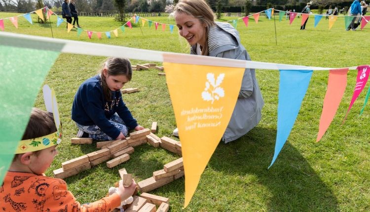 Family at a National Trust Easter event, what's on, children's activities - image credit: Paul Harris