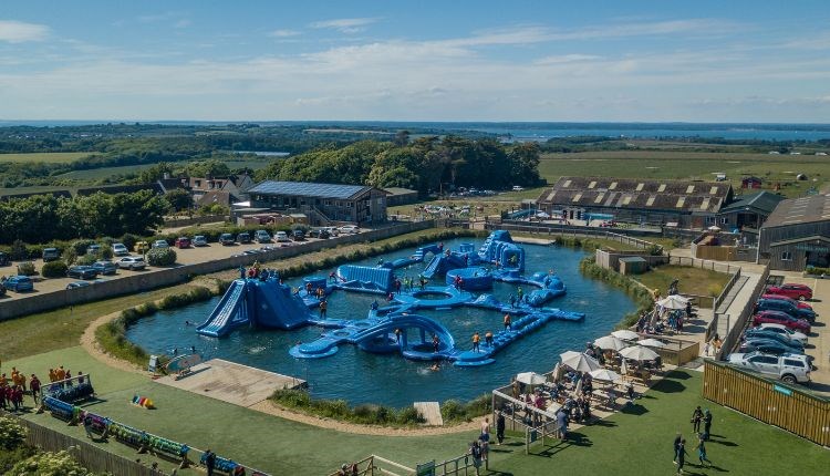 Aerial view of Isle of Wight Aqua Park at Tapnell Farm, outdoor watersports, activities, Isle of Wight