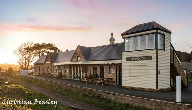 Sunset, outside view of Off The Rails Yarmouth, Isle of Wight, restaurant