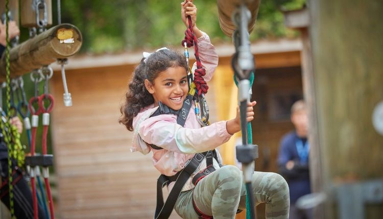 Girl on zipwire at PGL Little Canada, Wootton, Isle of Wight, Things to do, event, what's on, children's activities