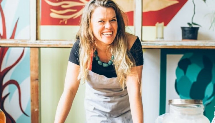 visit isle of wight, things to do, woman smiling in art studio