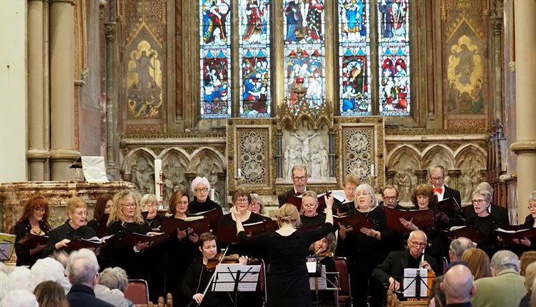 Choir performing to an audience in a church, music at Newport Minster, Isle of Wight, what's on, event