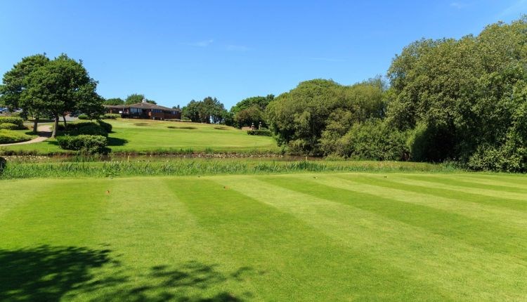 Course and clubhouse at Sandown & Shanklin Golf Club, Isle of Wight, activity