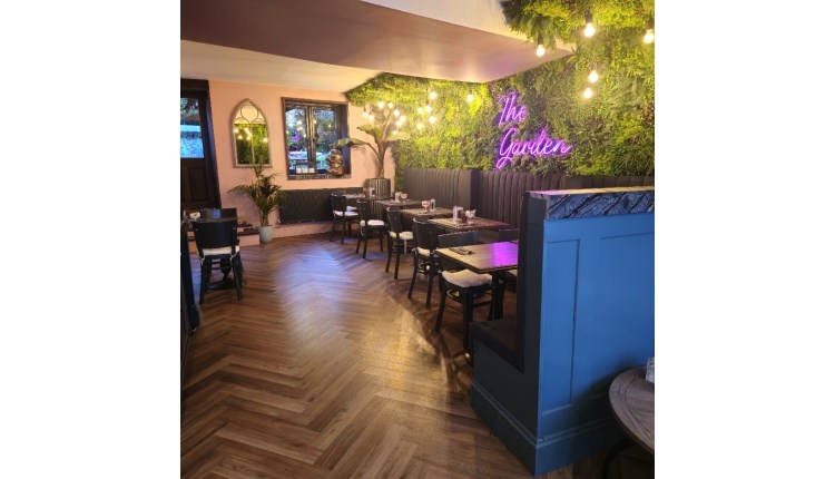 Isle of Wight, Eating Out, The Garden, Cowes, Inside seating with neon sign