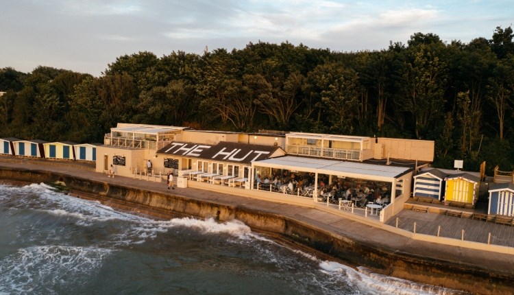 The Hut, Isle of Wight, Sea Front Dining, Frontage at high tide
