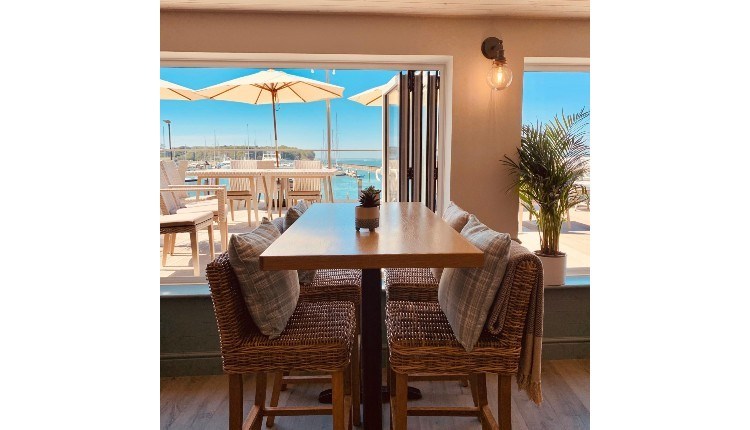 View of Yarmouth Harbour from inside and outside seating areas, The Terrace Yarmouth, restaurant