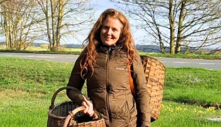 Visit Isle of Wight, Things to do, Woman by roadside with homemade willow basket.