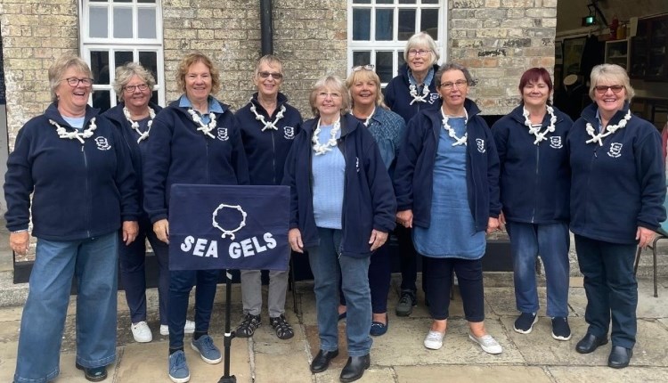 Visit Isle of Wight, things to do, group of women singing sea shanties